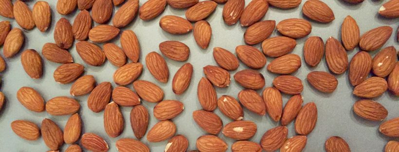 Almonds on a baking sheet.